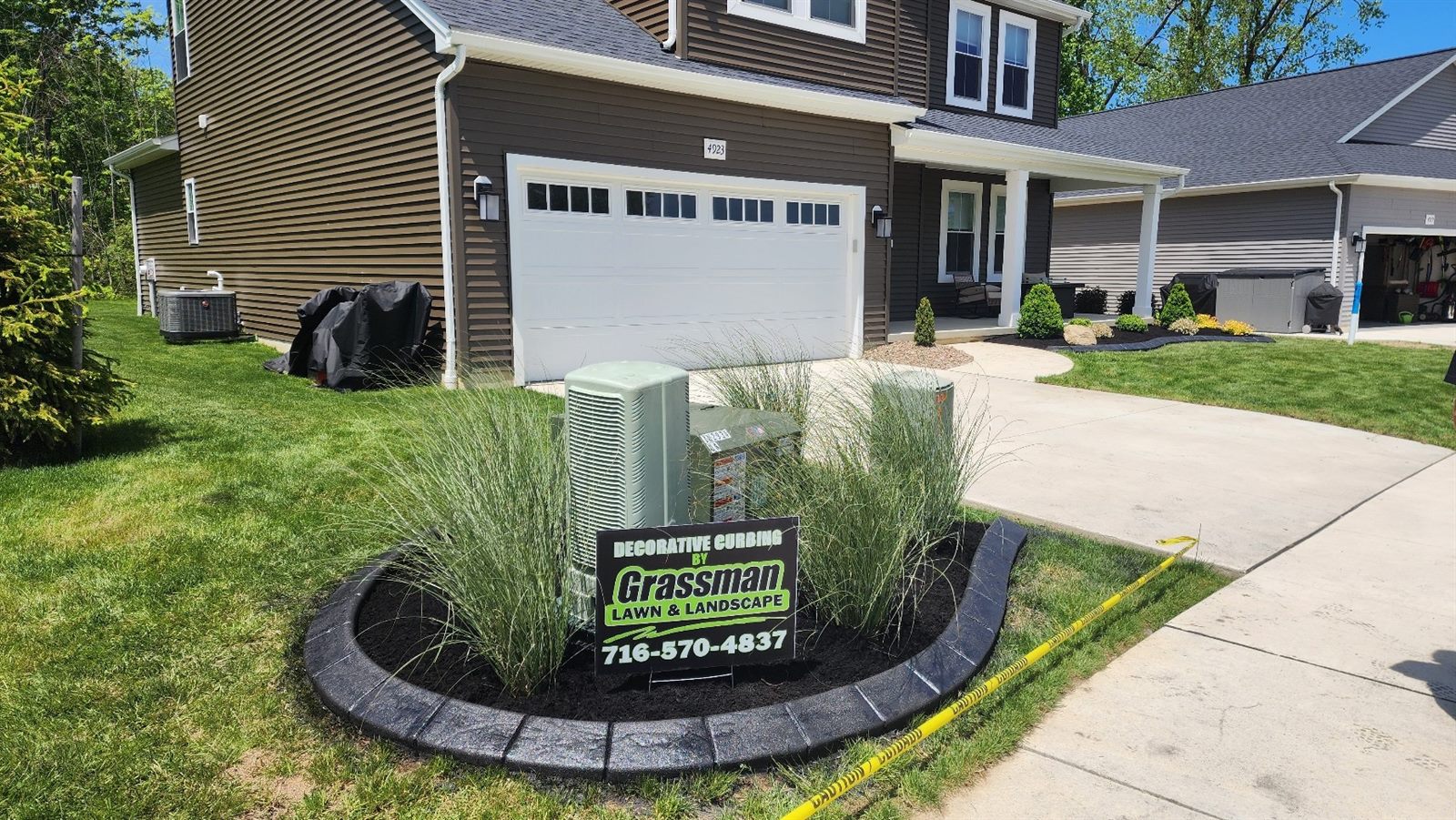 Decorative curbing framing a landscaped island